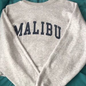 A crew neck cropped sweater